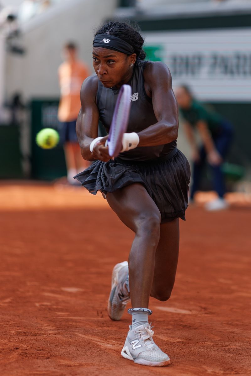 Coco Gauff of United States plays a backhand against Mayar Sherif of Egypt.