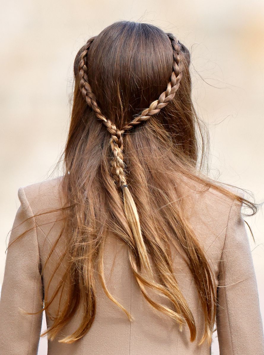 Princess Charlotte's hairstyles rarely feature brightly colored bands or novelty scrunchies.