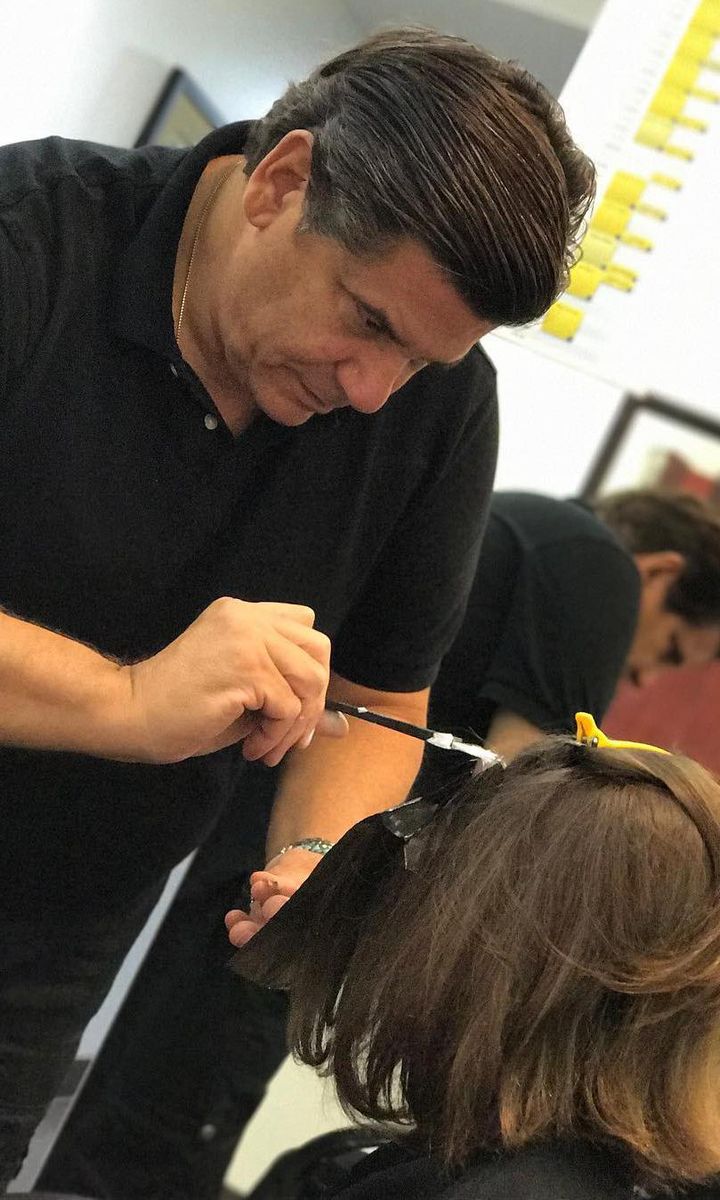 Michael Canalé at his beauty salon
