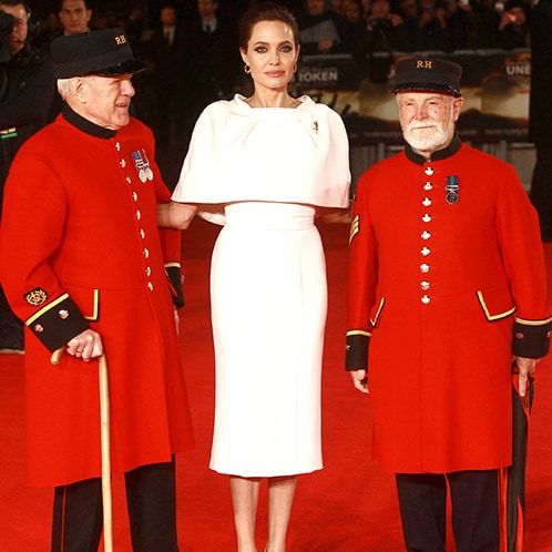 Angelina with Chelsea pensioners James Walter Fellows and Cecil Bake