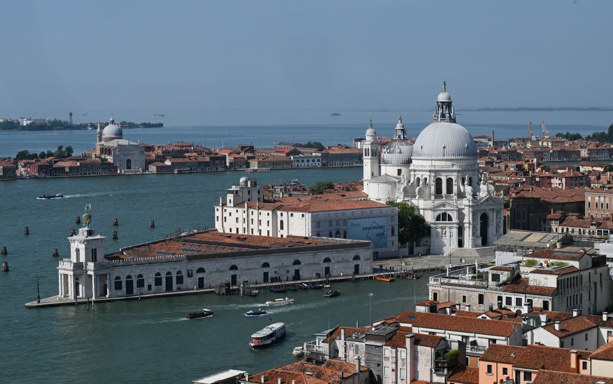 The breathtaking Palazzo Grassi along the Grand Canal in Venice, beautifully lit up to host the three generations of the Pinault dynasty.