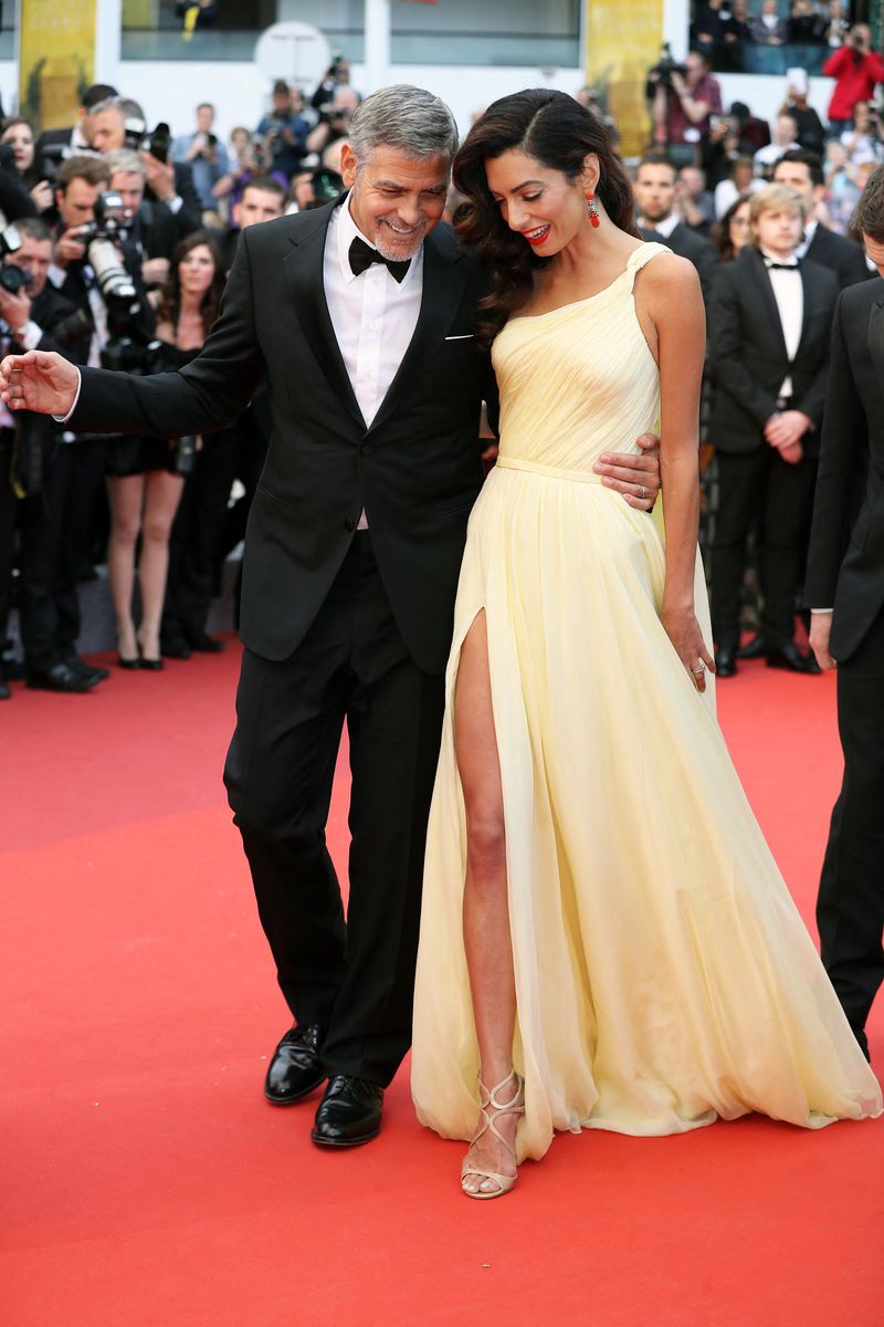 George and Amal Clooney arrive for the screening of the film "Money Monster" at the 69th Cannes Film Festival in Cannes, 2016