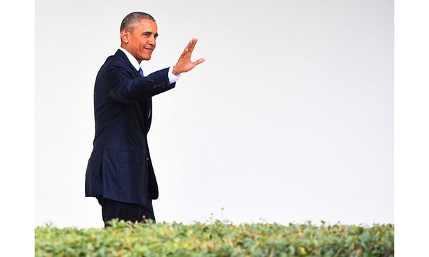 President Obama officially handed over the White House and waved as he left the Oval Office for the last time.
Photo: Getty Images