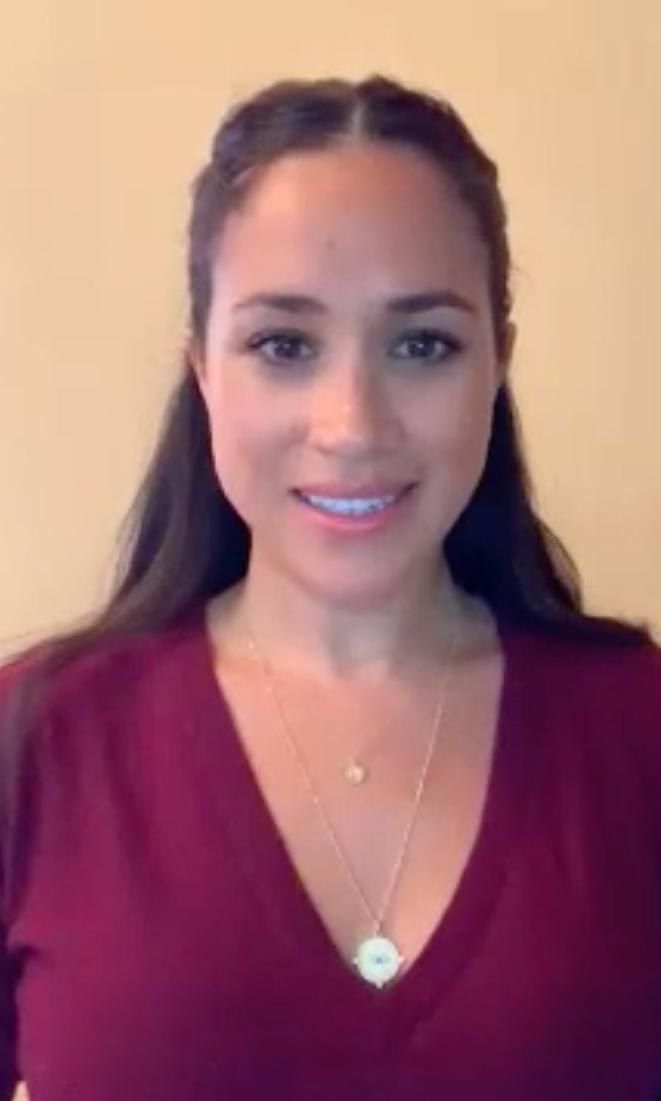Meghan wore her hair half up, half down for the video call in March