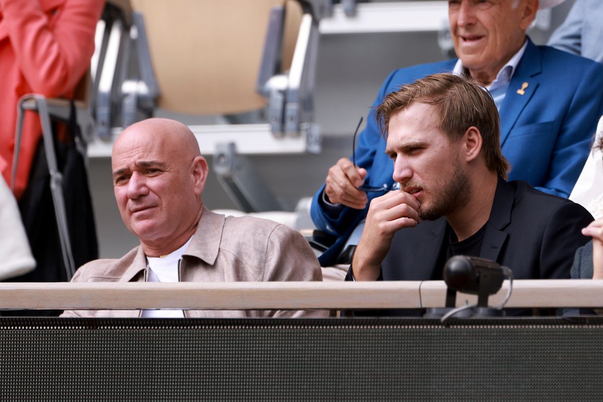 Andre Agassi and his son, Jaden, attended the men's semifinals at Roland Garros, where the 24-year-old's towering height caught fans' attention.