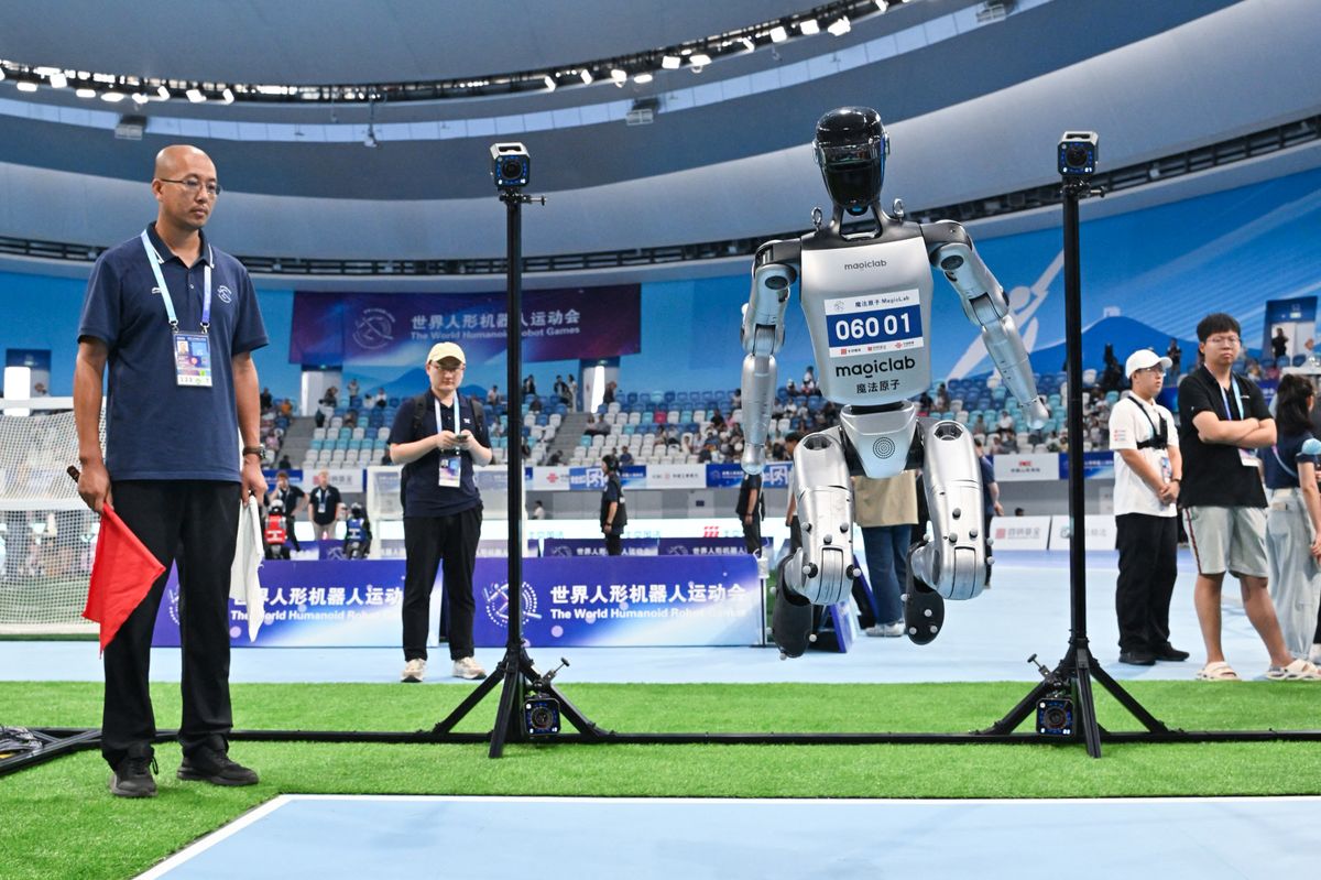 A robot competes in the high jump category