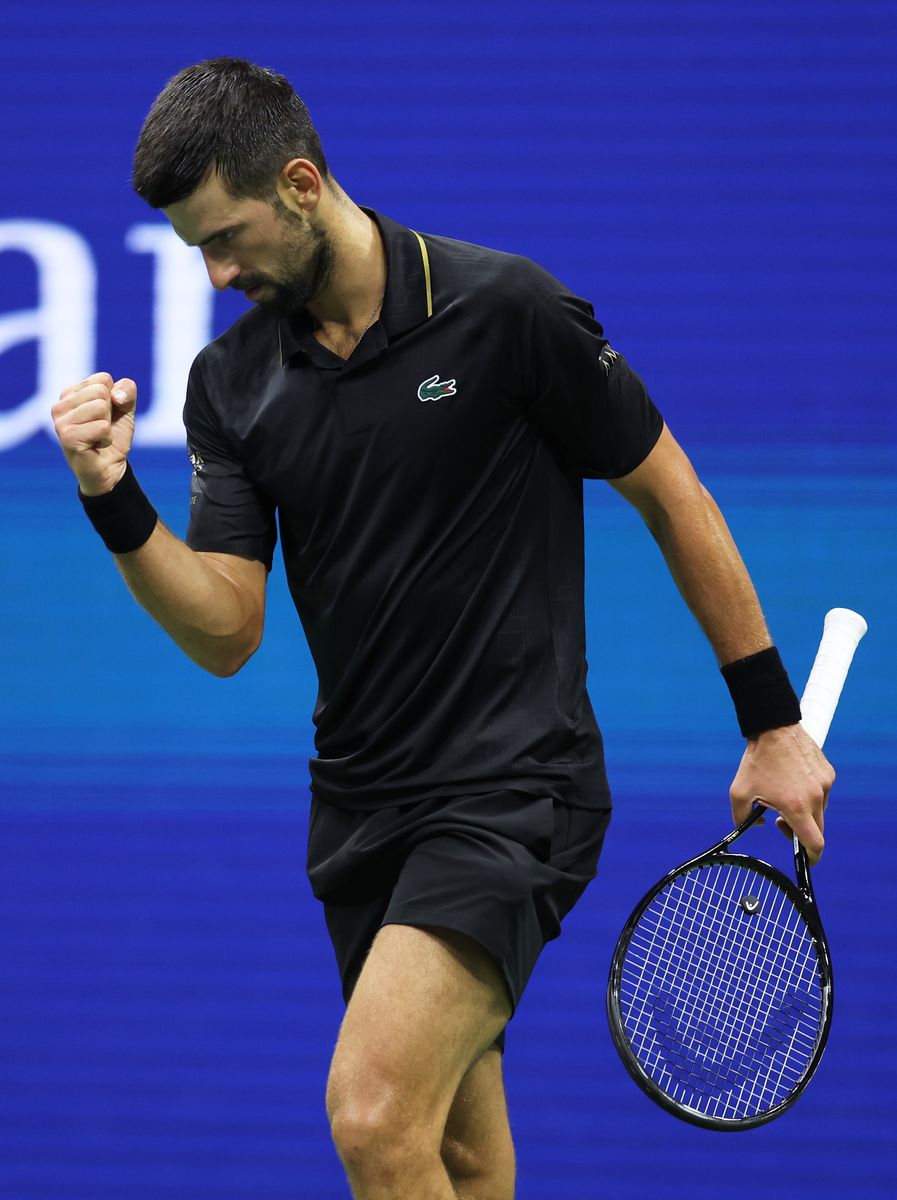 Novak Djokovic of Serbia celebrates winning the first set against Taylor Fritz of the United States during their Men's Quarterfinal match on Day Ten of the 2025 US Open 