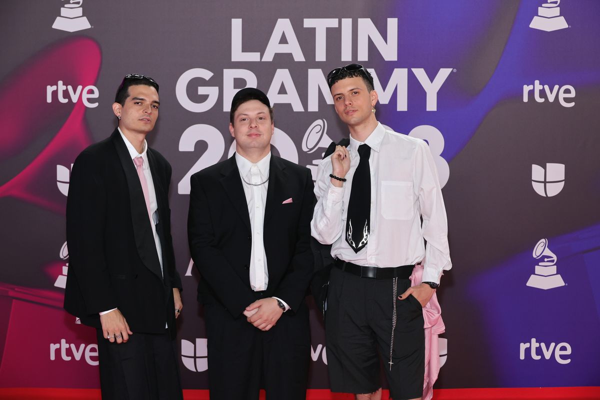 SEVILLE, SPAIN - NOVEMBER 16: (L-R) Gabriel Orozco, Lucca Beguerie Petrich and Juan Mango of the band Usted SeÃ±alemelo attend The 24th Annual Latin Grammy Awards on November 16, 2023 in Seville, Spain. (Photo by Neilson Barnard/Getty Images for Latin Recording Academy) 