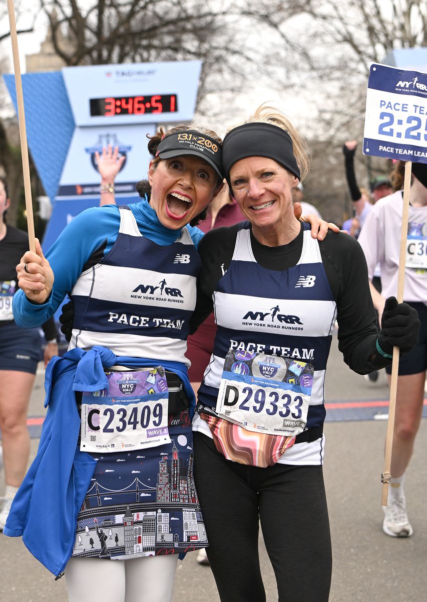  Julia Khvasechko poses after crossing the finish line during the 2026 United Airlines NYC Half Marathon 