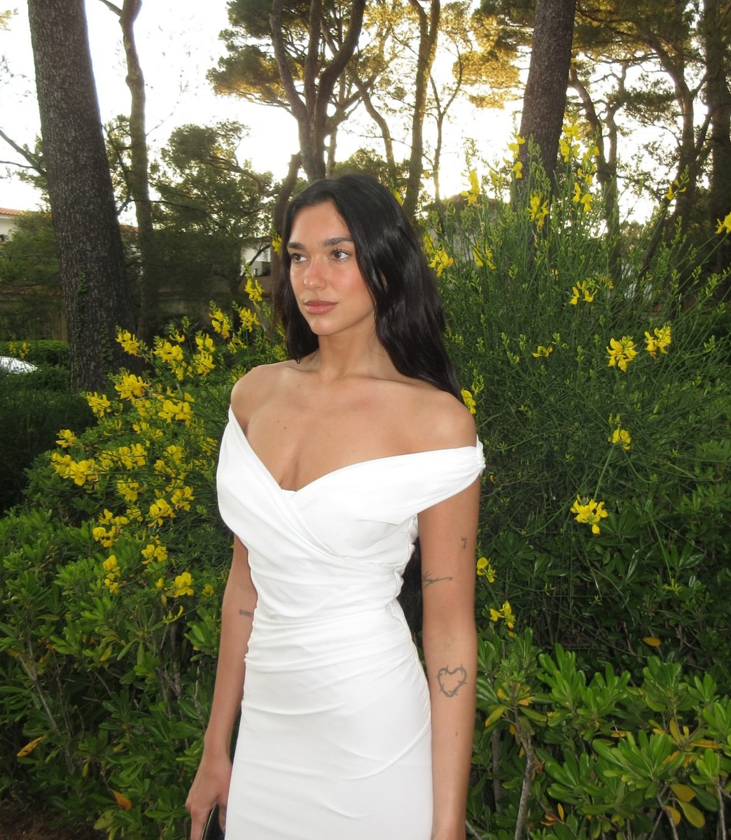 Dua Lipa poses in white bridal dress amid engagement to Callum Turner