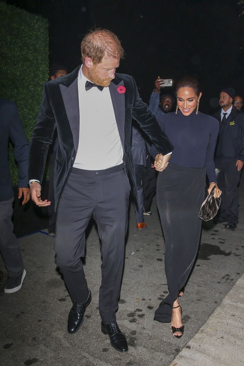 Prince Harry, 41, played the ultimate gentleman, perfectly embracing the Bond aesthetic in a classic tuxedo and bow tie.