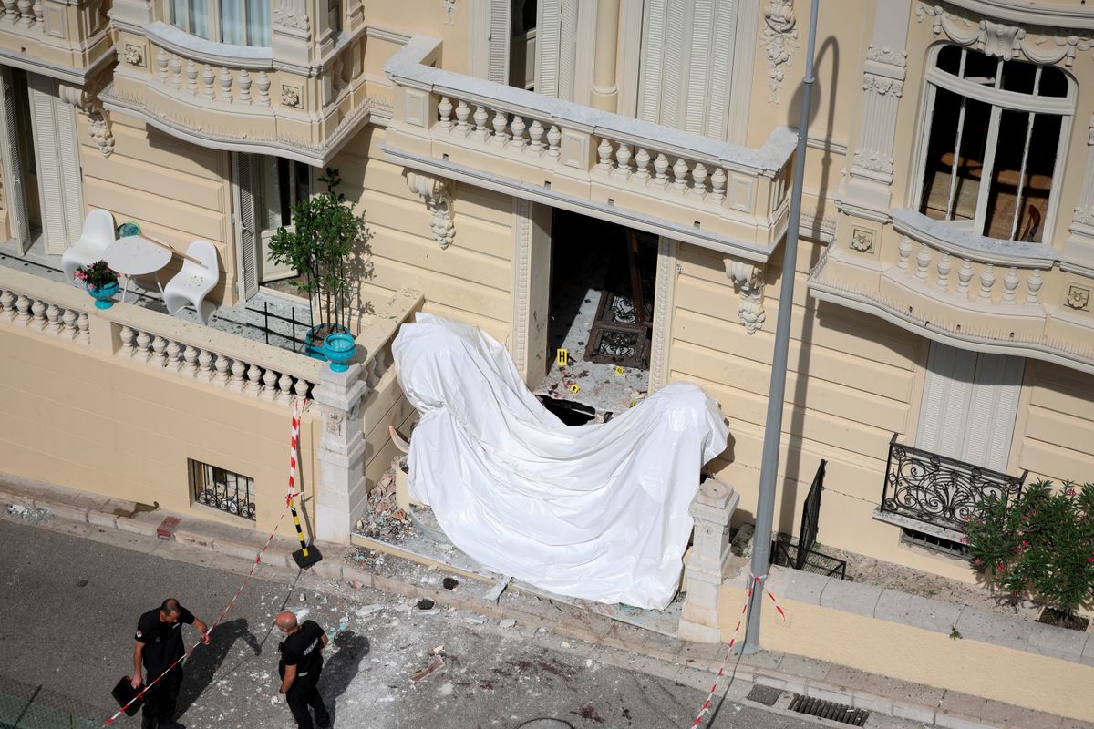 Members of a bomb disposal team operate the day after an alleged attack involving an explosive device in the lobby of a residential building, in Monaco on June 30, 2026. 