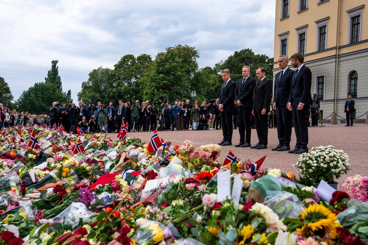 Norway's Energy Minister Terje Aasland, Transport Minister Jon-Ivar Nygard, Foreign Minister Espen Barth Eide, Finance Minister Jens Stoltenberg and Health and Care Services Minister Jan Christian Vestre pay their respect after laying flowers at the Palace Square after Norway's King Harald V passed away, in Oslo, Norway, on August 28, 2026.