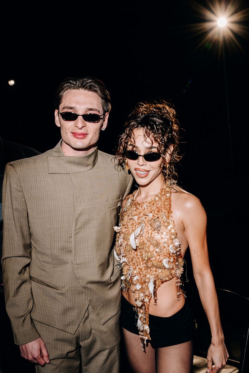 Peso Pluma showed off his laid-back sense of style while joining the fashion crowd in New York.