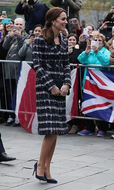 The Duchess of Cambridge stepped out in Manchester on Friday wearing a pink and navy coat by British brand Erdem.
Photo: PA