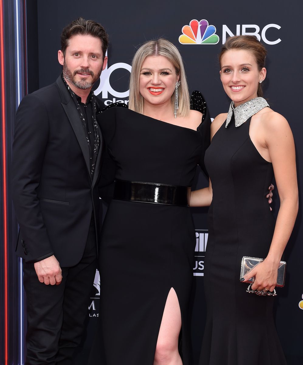 Host Kelly Clarkson (C), Brandon Blackstock and Savannah Blackstock attend the 2018 Billboard Music Awards at MGM Grand Garden Arena on May 20, 2018 in Las Vegas, Nevada.  (Photo by Axelle/Bauer-Griffin/FilmMagic)