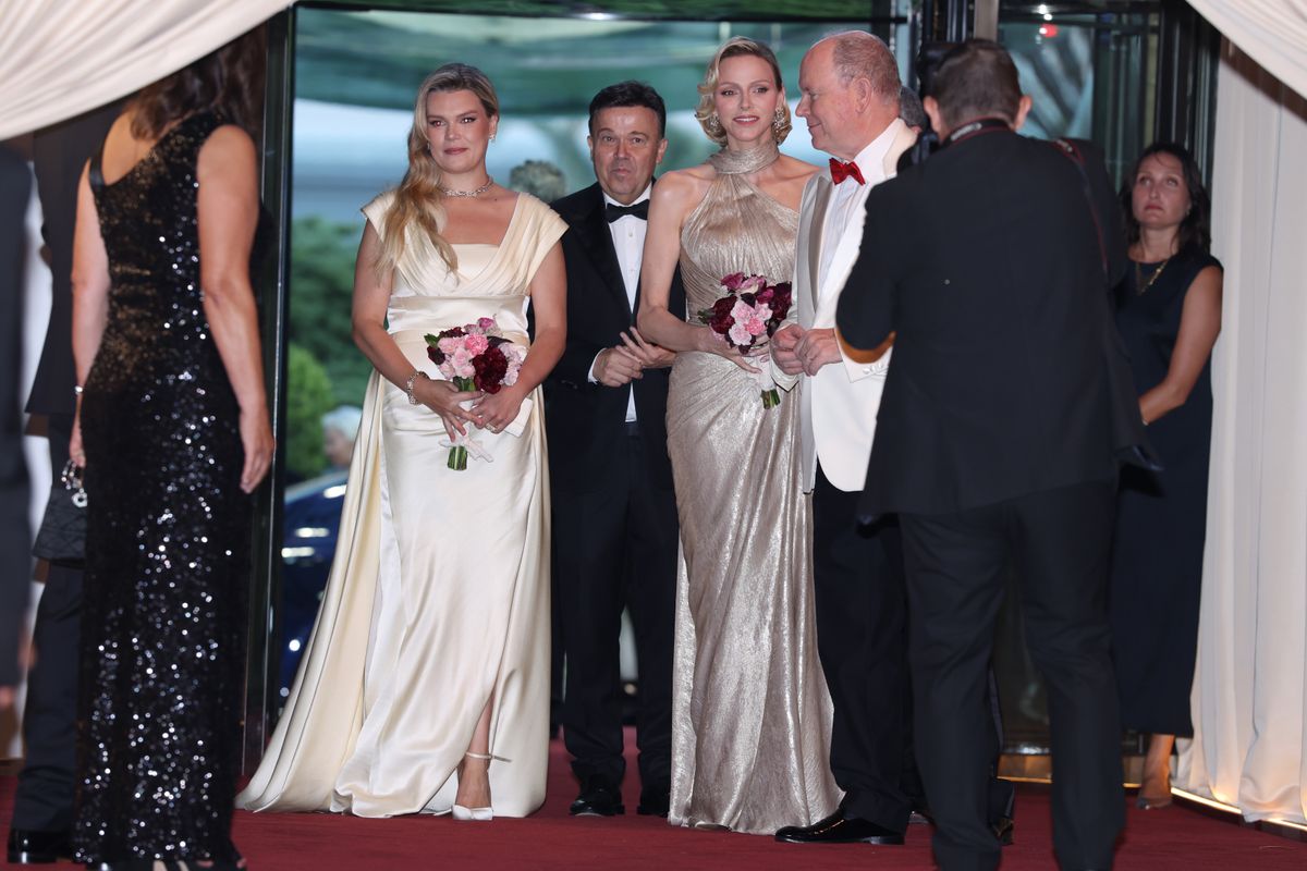 Princess Charlene and Camille Gottlieb coordinated in elegant neutral gowns as they arrived at the 77th Monaco Red Cross Gala in Monte Carlo.