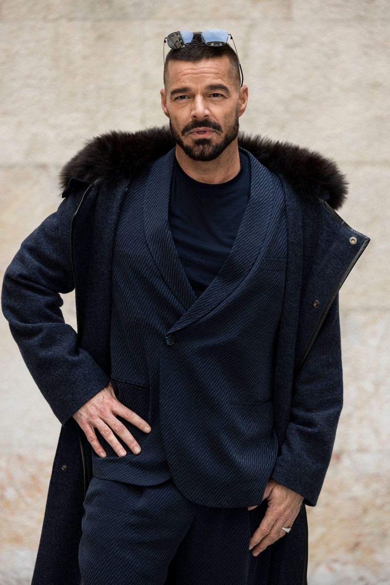 Ricky Martin arrives at the Giorgio Armani fashion show during the Milan Fashion Week