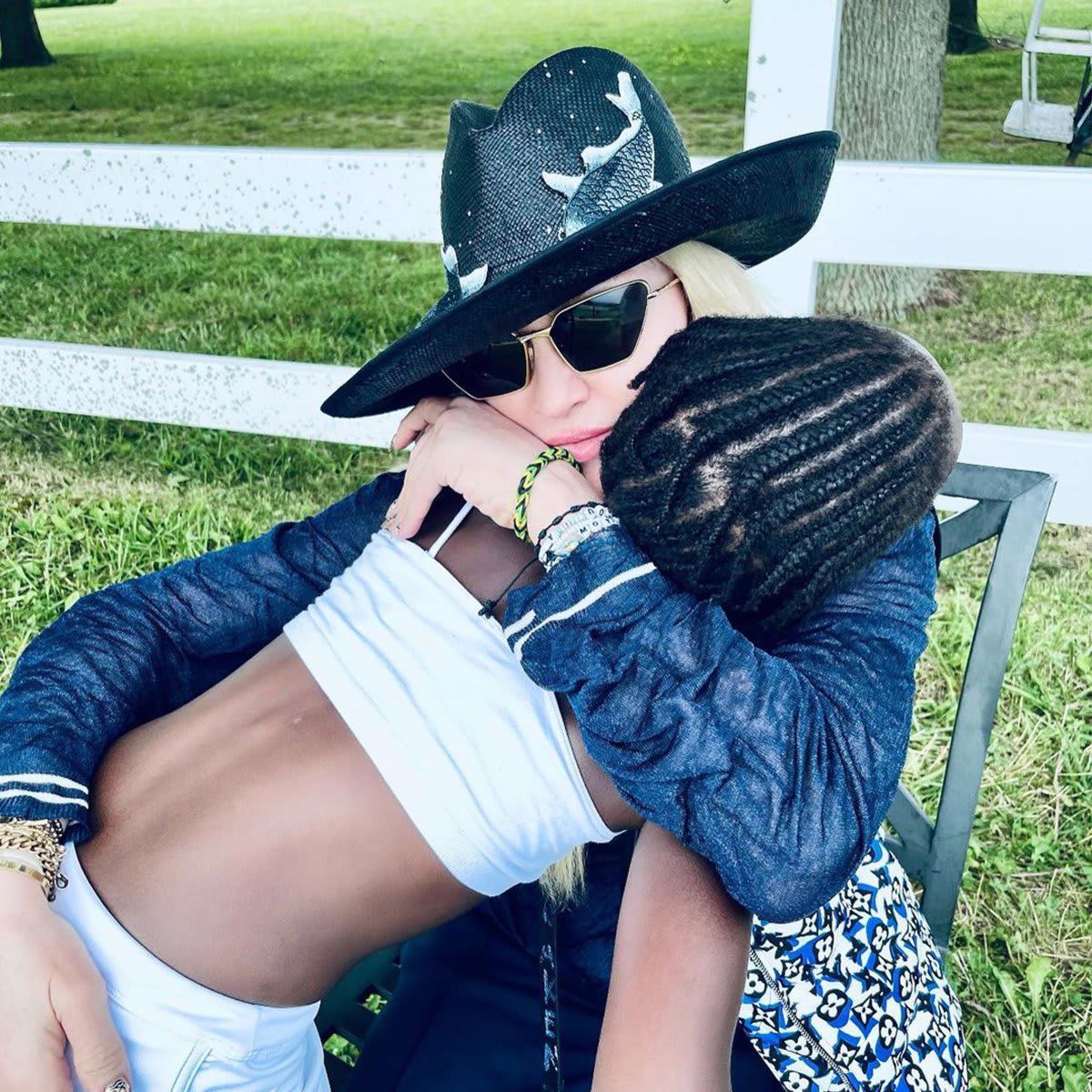 Madonna relaxes on the ranch with her children