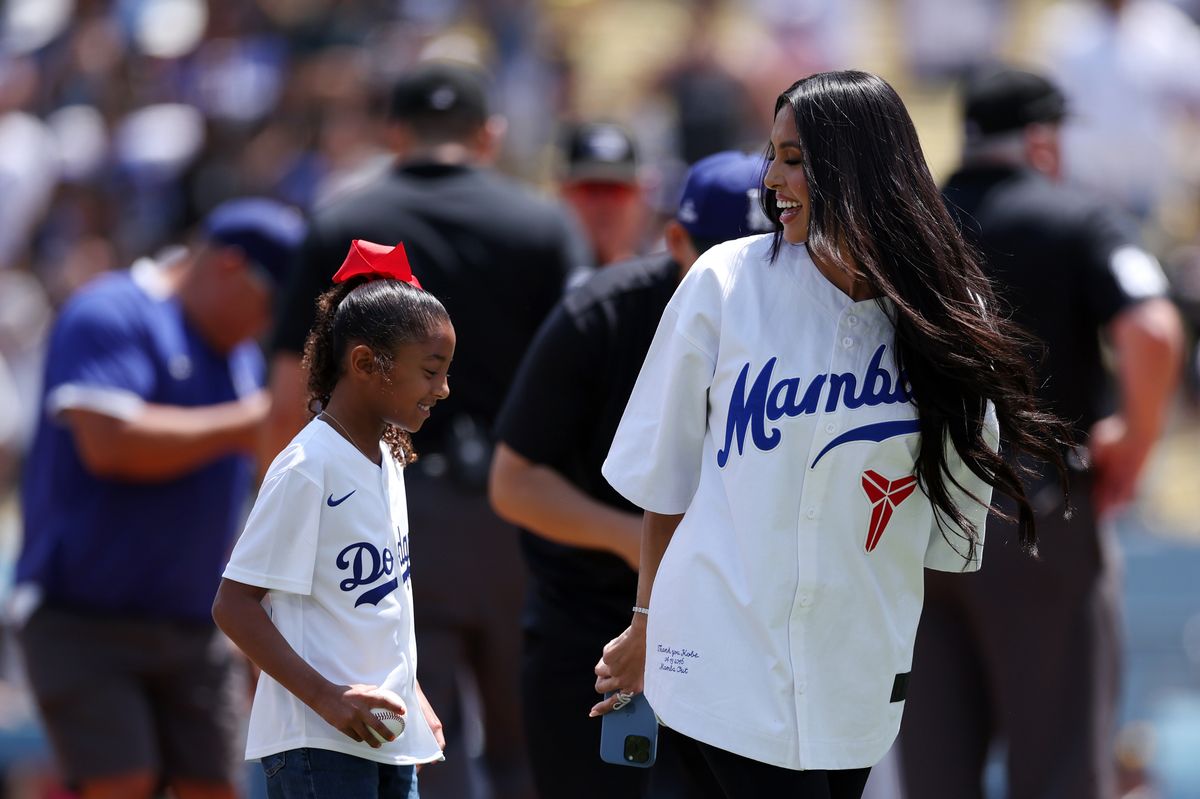 Bianka and Vanessa Bryant walk off the field after the first pitch before the game between the Los Angeles Dodgers and the Tampa Bay Rays, August 25, 2024 