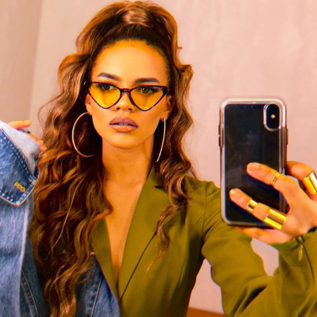 Leslie Grace half up half down