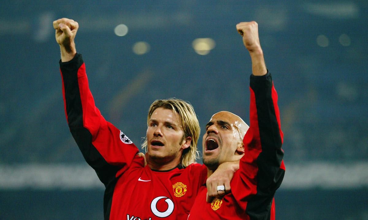 David Beckham and Juan Sebastian Veron of Manchester United celebrate the opening goal