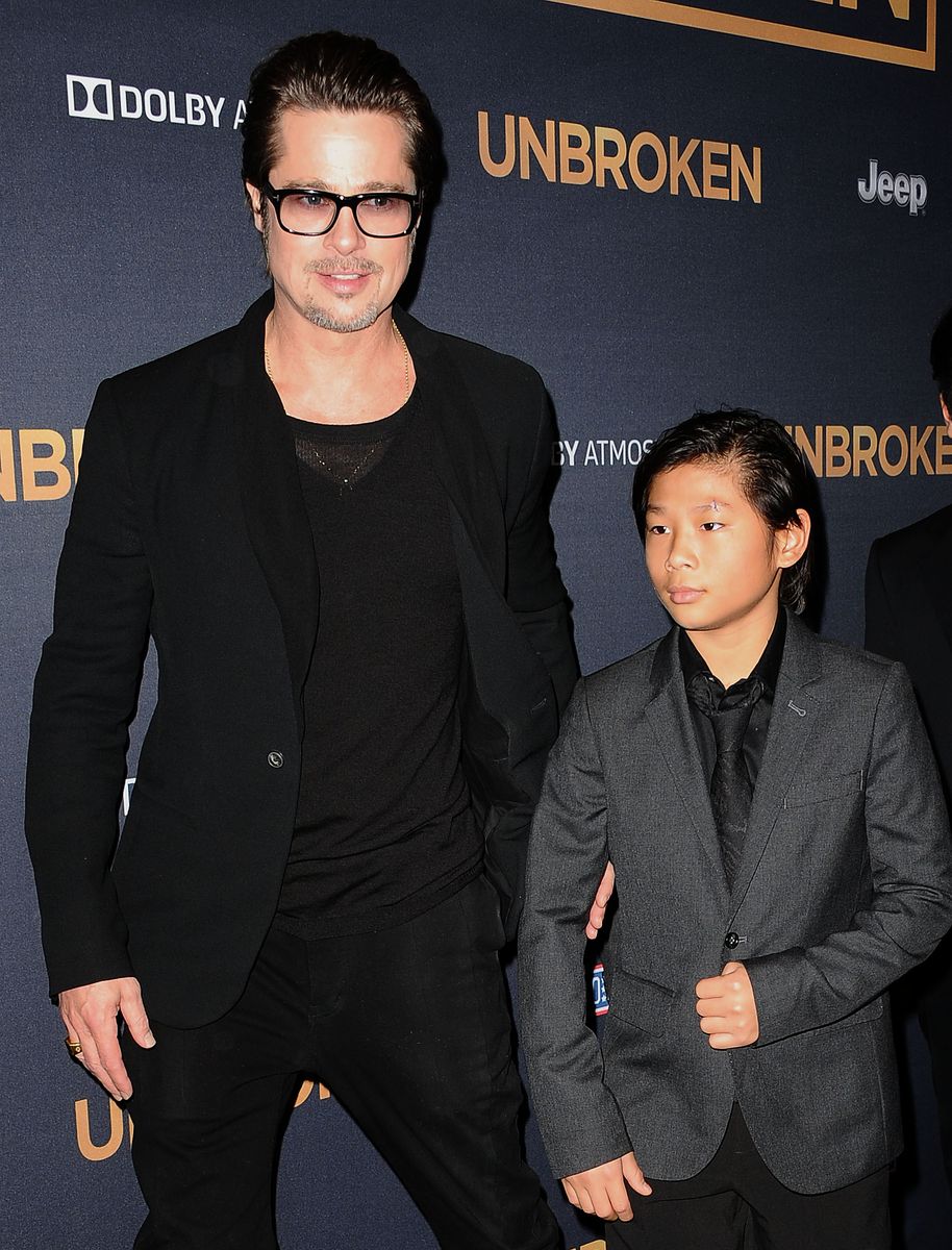 HOLLYWOOD, CA - DECEMBER 15:  Actor Brad Pitt and Pax Thien Jolie-Pitt attend the premiere of "Unbroken" at TCL Chinese Theatre IMAX on December 15, 2014 in Hollywood, California.  (Photo by Jason LaVeris/FilmMagic) 