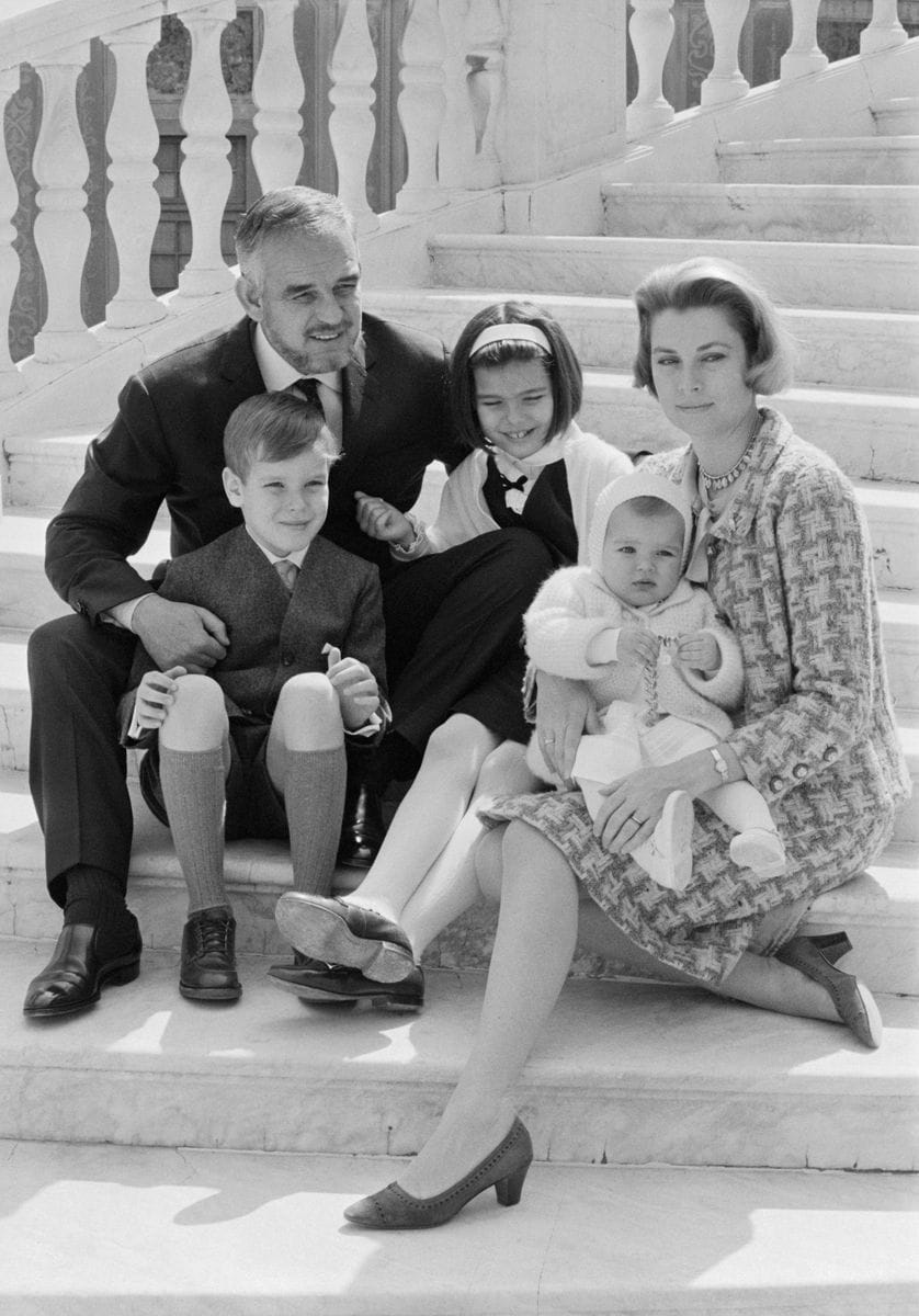 (Original Caption) Rainier and Grace Celebrate 10th Wedding Anniversary. Monte Carlo, Monaco: In connection with their tenth wedding anniversary celebration Prince Rainier and Princess of Monaco pose on the steps of the palace with their children: Princess Stephanie , 14 months; Princess Caroline, 9; and Prince Albert, 8. Asked to comment on 10 years of marriage, Princess Grace said: "They were good years...they have changed me. I hope for the better...there have been difficult times, but no great surprises."