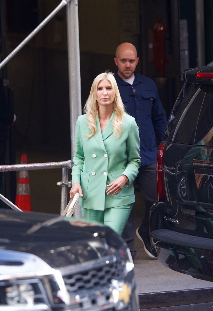 Ivanka Trump pairs her mint-green double-breasted Sandro suit with white strappy heels and loose blonde waves for her latest New York outing.