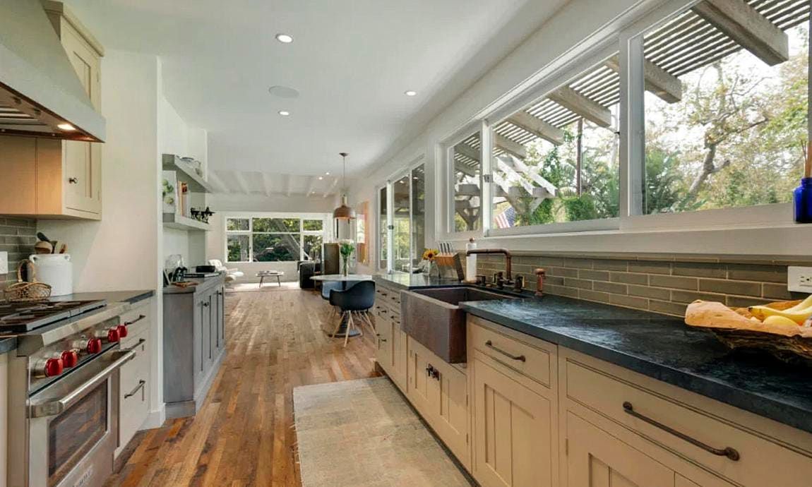 The kitchen in this rustic style home.