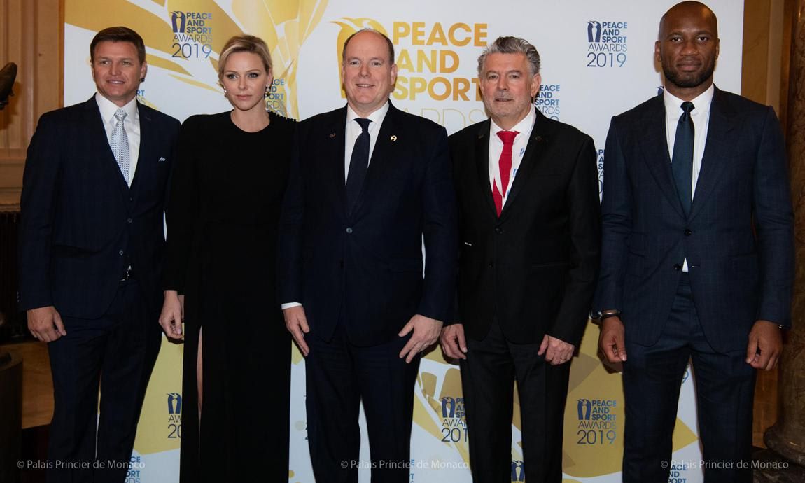 Princess Charlene's brother (left) was also in attendance at the ceremony