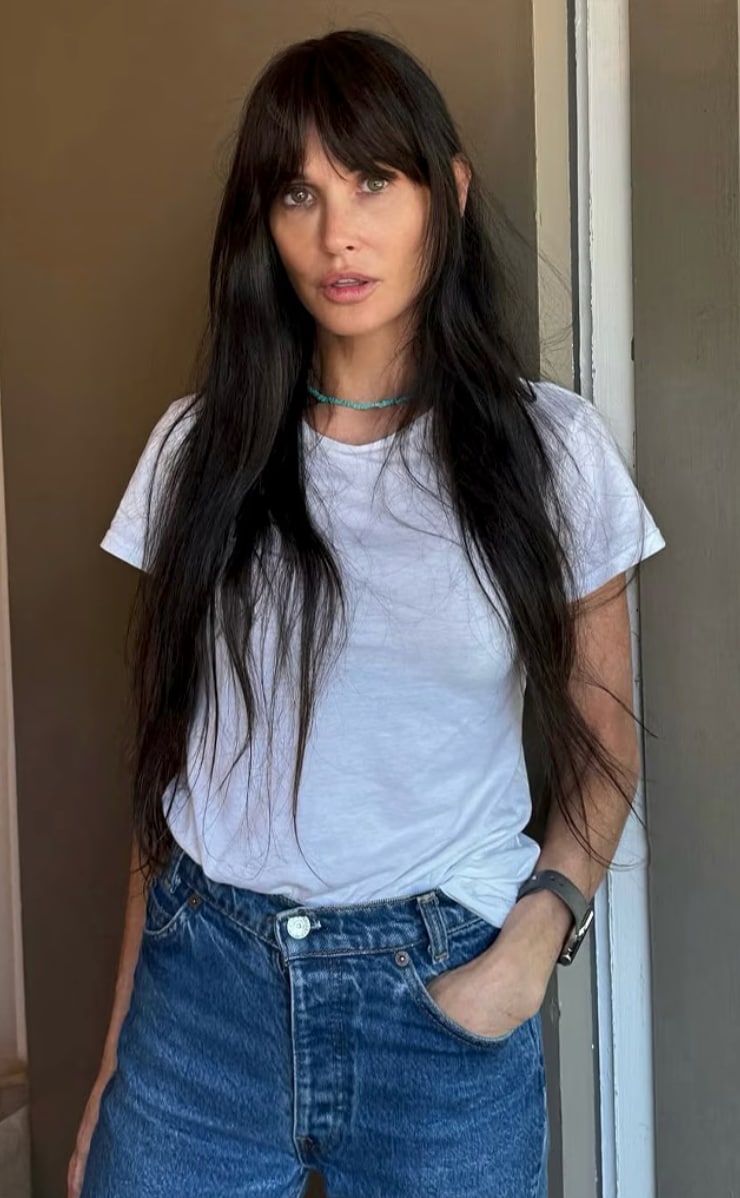 Demi Moore surprised fans this week by reviving one of her most recognizable looks, posing in the blunt bangs she first wore nearly three decades ago in 'Striptease.'
