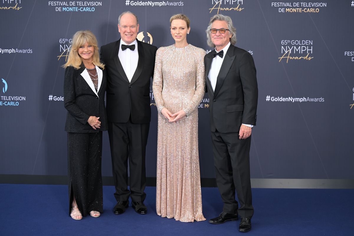 Princess Charlene, Prince Albert II, Kurt Russell and Goldie Hawn pose together during the Golden Nymph Awards ceremony at the 65th Monte-Carlo Television Festival.