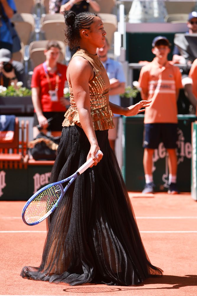 PARIS, FRANCE - MAY 26: Naomi Osaka of Japan enters the court wearing a custom Nike black dress ahead of her first round match against Laura Siegemund of Germany on day 3 of the 2026 French Open, Roland-Garros 2026, a Grand Slam tennis tournament at Stade Roland Garros on May 26, 2026 in Paris, France. (Photo by Jean Catuffe/Getty Images) 