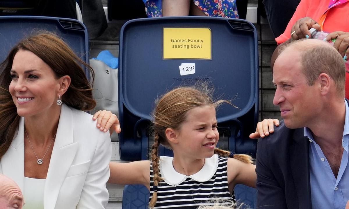 Charlotte was pictured resting her arms on her parents' shoulders while at the University of Birmingham Hockey and Squash Centre.