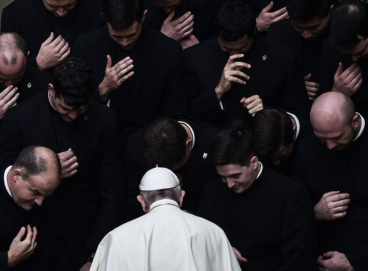 Pope Francis prays with priests at the end of a limited public audience at the San Damaso courtyard in The Vatican on September 30, 2020 during the COVID-19 infection, caused by the novel coronavirus. (Photo by Filippo MONTEFORTE / AFP) (Photo by FILIPPO MONTEFORTE/AFP via Getty Images)          