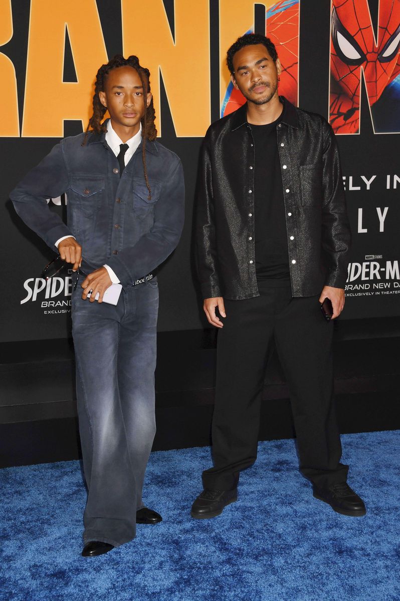 Jaden Smith kept his accessories minimal, tucking black sunglasses into his pocket and completing his denim ensemble with classic black leather shoes.