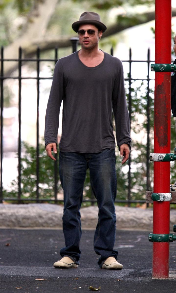 Brad Pitt visits playground with children