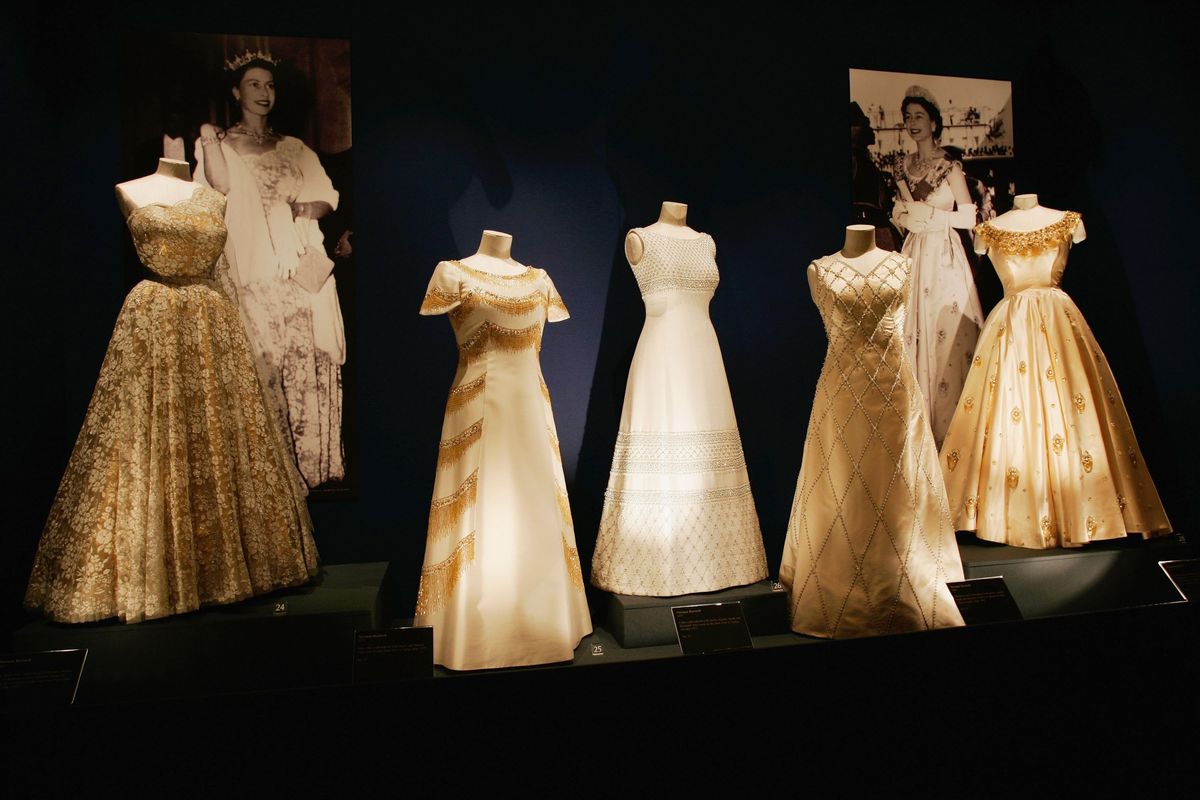 Beaded and embroidered white and gold evening dresses designed by Sir Norman Hartnell for Queen Elizabeth II 