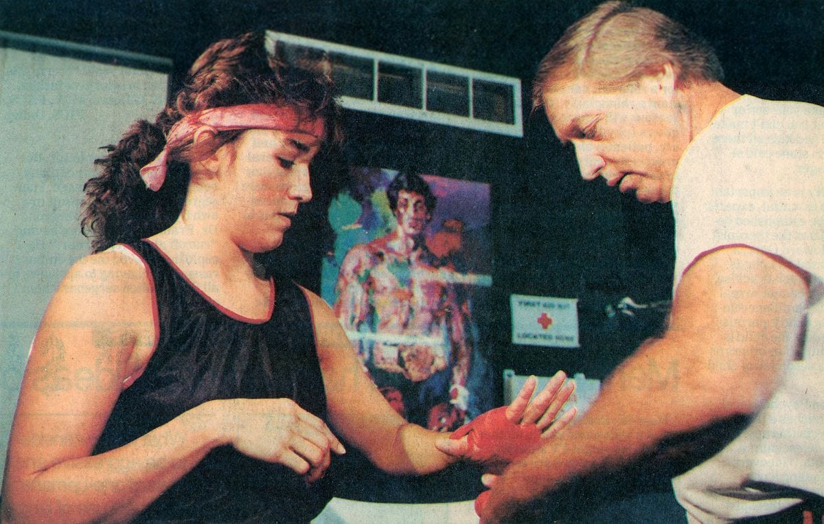 Christy Martin prepares for a training session with her then husband and trainer Jim Martin