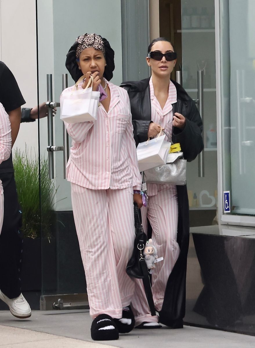 Kim Kardashian leaving Purelux Scalp Spa in Los Angeles after a two-hour treatment with her daughter North West