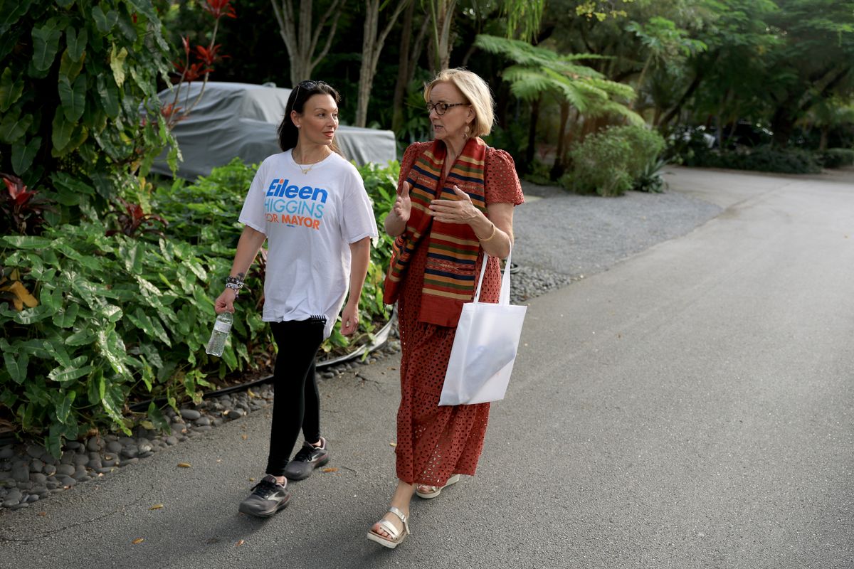 City of Miami Mayoral candidate Eileen Higgins (R) and Florida Democratic Party Chair Nikki Fried canvass a neighborhood for votes.