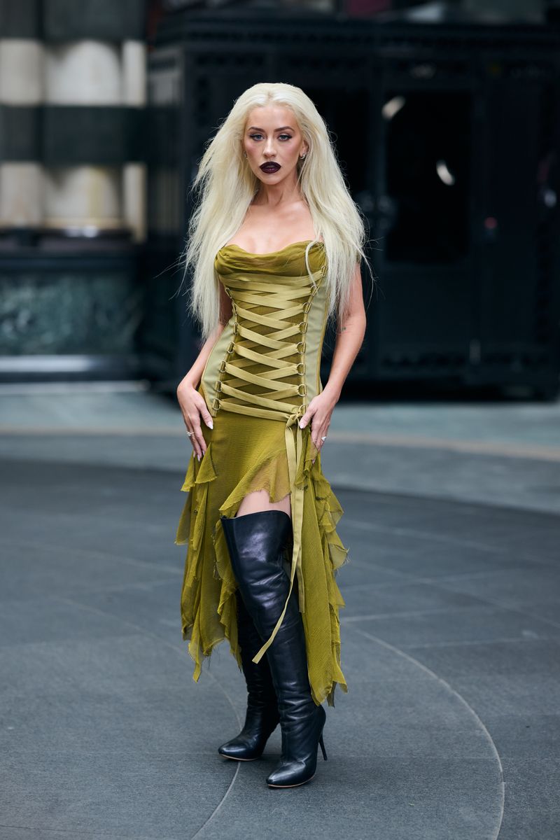 Christina Aguilera attends a photocall for "Burlesque: The Musical" at The Savoy Theatre on July 21, 2025 in London, England