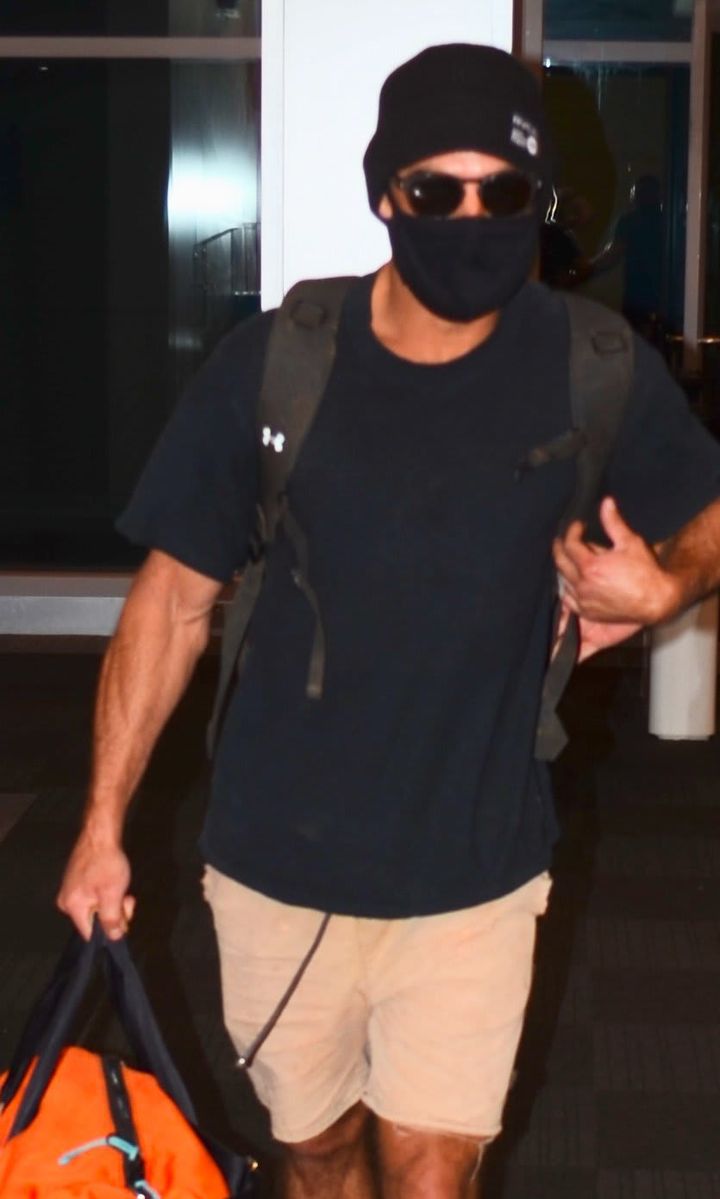 Zac Efron and Vanessa Valladares arriving at the airport
