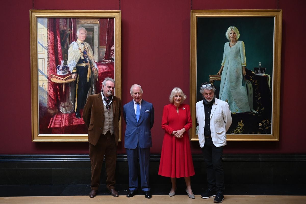 LONDON, ENGLAND - MAY 06:  Artist Peter Kuhfeld, King Charles III, Queen Camilla and Artist Paul S. Benney pose with their official Coronation State Portraits during a visit to The National Gallery on May 06, 2025 in London, England. To mark the second anniversary of their Coronation, The King and Queen will unveil their official Coronation State Portraits by Peter Kuhfeld and Paul S. Benney, now part of The Royal Collection. The portraits will be revealed in the Central Hall, followed by the reopening of the refurbished Sainsbury Wing. Their Majesties will then tour the space and meet participants in the gallery's outreach education programme. (Photo by Eddie Mulholland - WPA Pool/Getty Images)