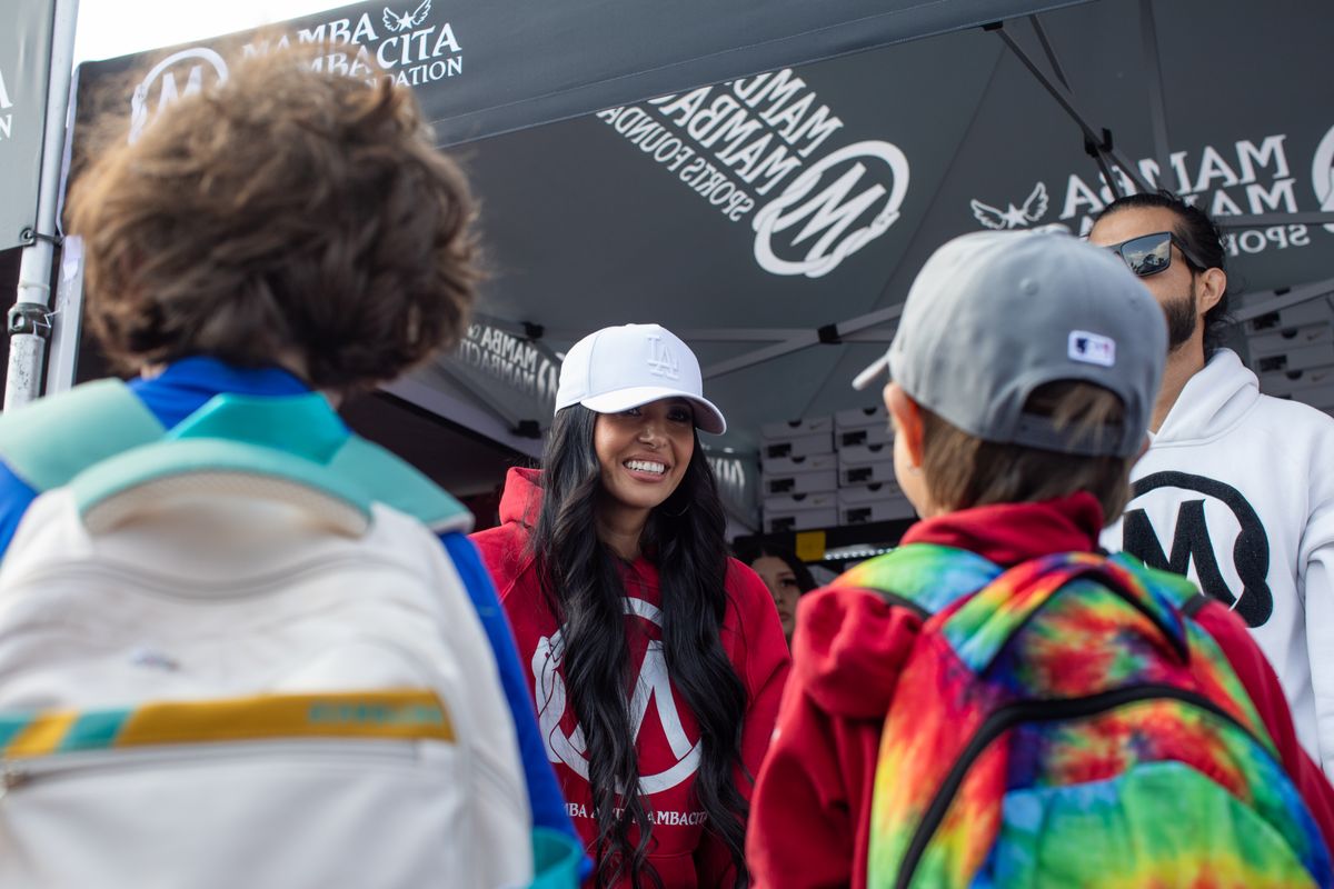 Vanessa Bryant, the mother of four daughters with her late husband Kobe Bryant, talks to kids affected by the LA wildfires in an essentials distribution event at Dodger Stadium on January 17, 2025 in Los Angeles, California. 