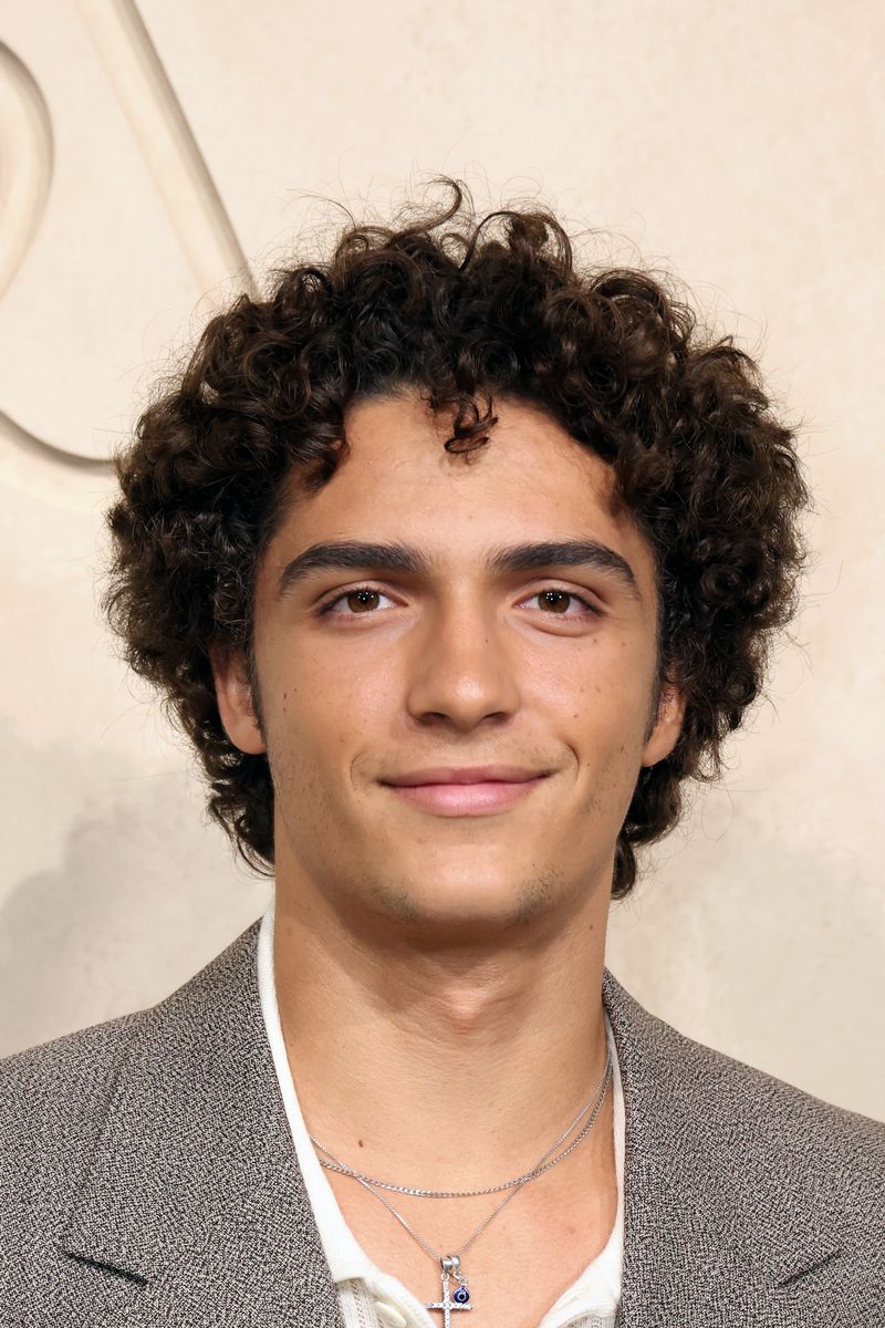 With his tousled curls and familiar smile, Levi McConaughey bears a resemblance to both of his famous parents.