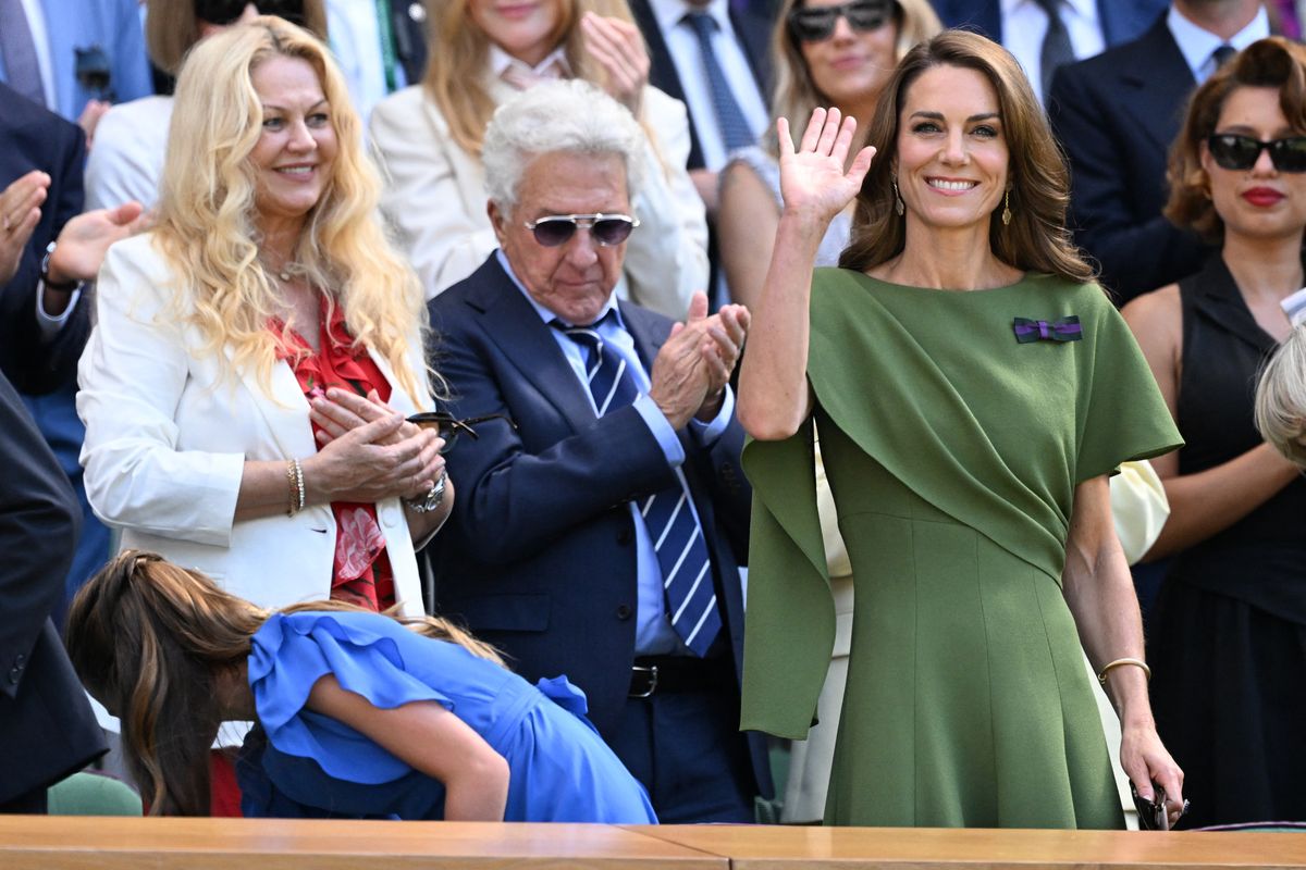 Kate Middleton arrived at Wimbledon in an elegant green midi dress, a color that pays tribute to the tournament's iconic grass courts and longstanding traditions.