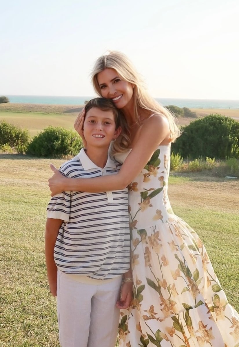 Ivanka embraced romantic summer style in a flowing white sundress with yellow orchids.