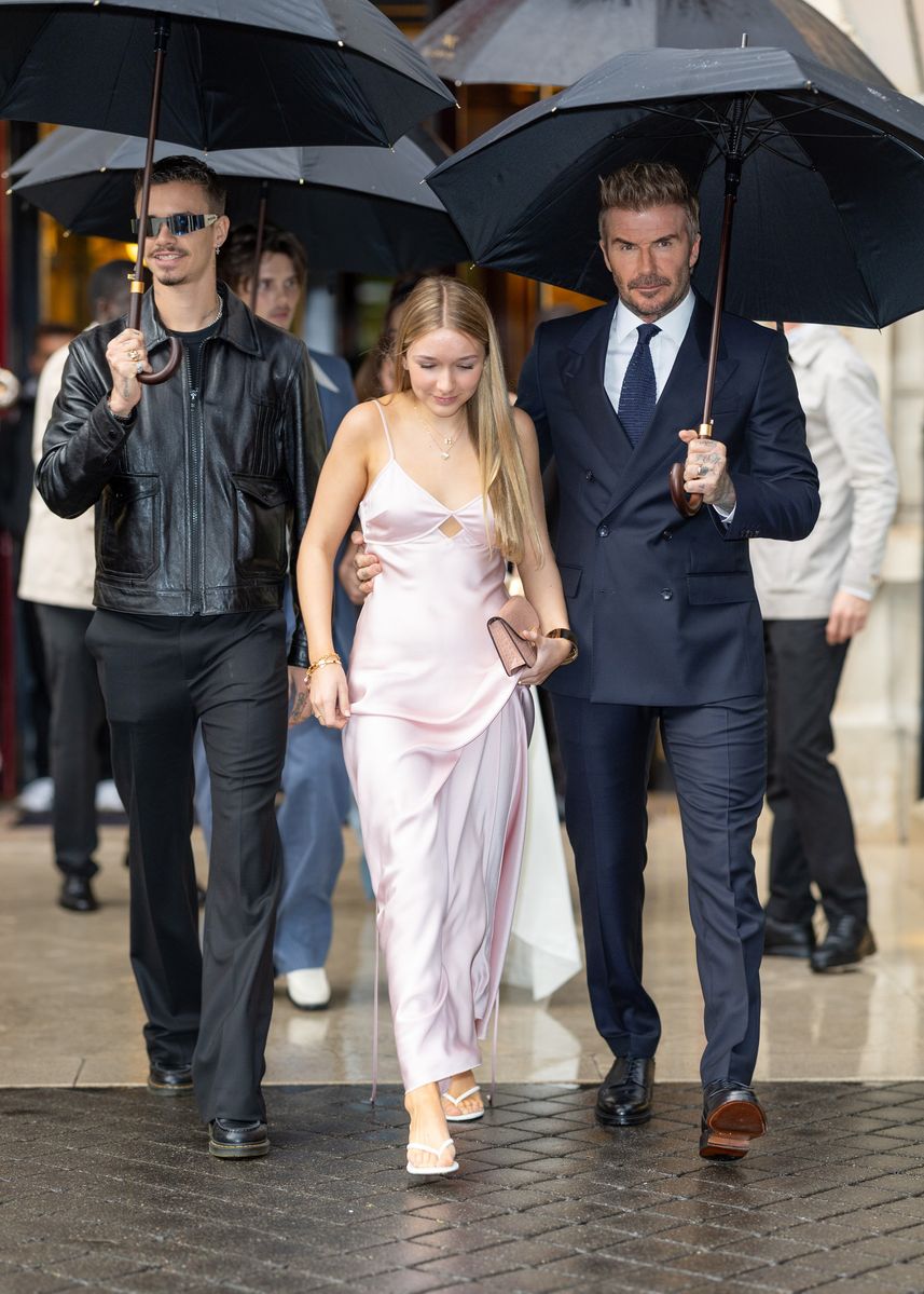 Harper Beckham stuns in a pink gown as she supports Victoria Beckham s Paris runway show